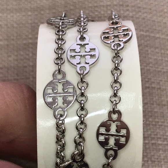 Tory Burch Jewelry - Tory Burch emblem bracelet (silver). NWOT
